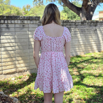 Pink floral mini dress with puff sleeves, sweetheart neckline, and flowy fit. Perfect for spring, brunch, date nights, and feminine everyday style.