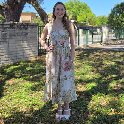 Floral midi dress in dusty blush or white with sweetheart neckline and flowy fit. Perfect for weddings, brunch, and special occasions.