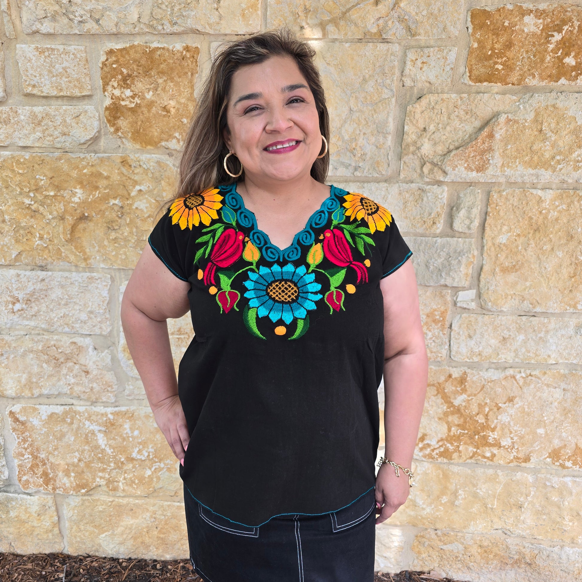 Fiesta embroidered blouse with colorful pajarito and floral design. Available in multiple colors. Lightweight top perfect for summer and Fiesta outfits.