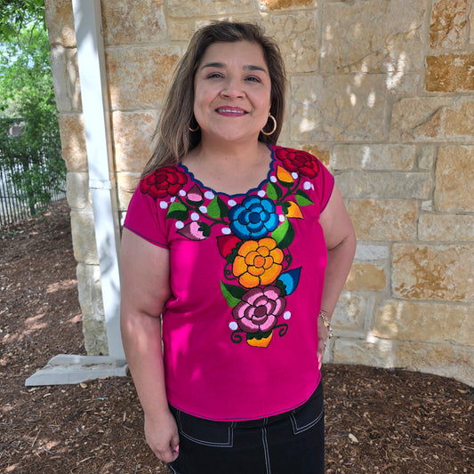 Bright embroidered Fiesta blouse with colorful floral design. Lightweight, vibrant top perfect for Fiesta outfits, summer style, and everyday wear.