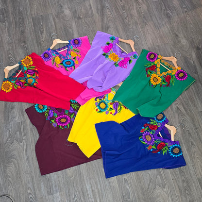 Fiesta embroidered blouse with colorful pajarito and floral design. Available in multiple colors. Lightweight top perfect for summer and Fiesta outfits.