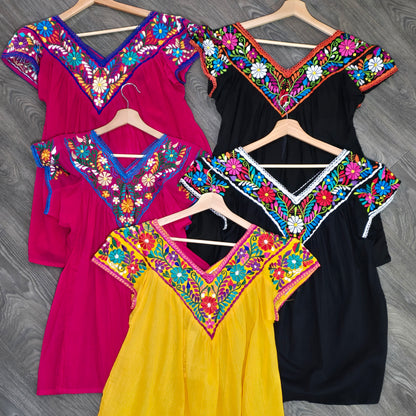 Colorful Fiesta embroidered clothing.